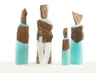 4 sculptures made out of cast glass and mika stone